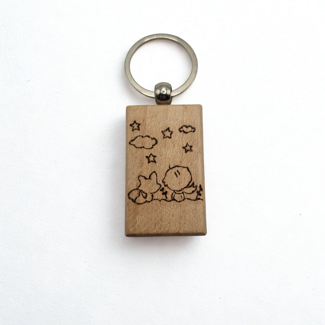 Portachiave in legno pirografato “Il Principe tra le stelle” | Incisi a Fuoco
