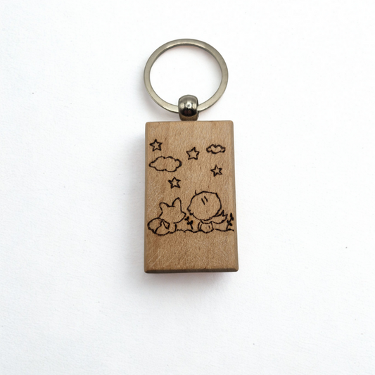 Portachiave in legno pirografato “Il Principe tra le stelle” | Incisi a Fuoco